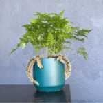 Teal ceramic pot with smooth matte finish, 11.5cm.