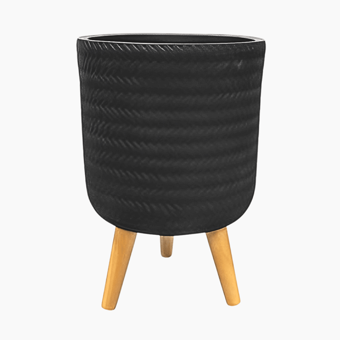 Fenne woven planter black Fenne woven planter on legs in dry green and black, handcrafted from sustainable materials for indoor use
