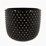 Handcrafted shiny black ceramic planter with gold accent spheres.