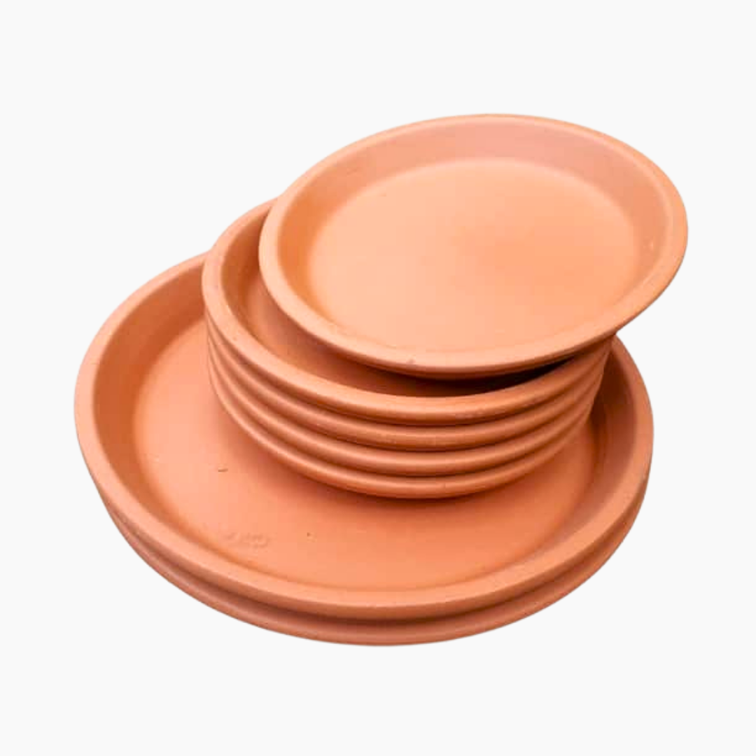 Raw Terracotta Saucers Drip Trays Raw terracotta saucers in various sizes for plant pots.