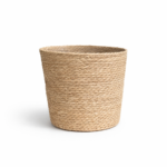 Extra extra large natural seagrass woven plant basket with plastic lining on white background.